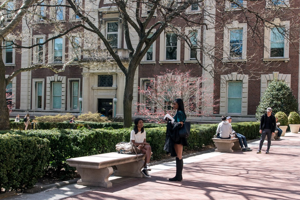 Students standing outside on campus